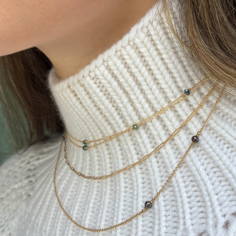 Halskæde i 14 karat guld med mørkebrune facetterede diamanter