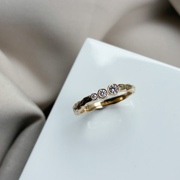 Merkur ring i 14 karat guld med 0,10 ct tw/vs diamanter