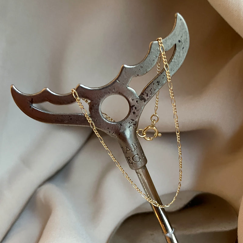 Figaro armbånd i 18 karat guld