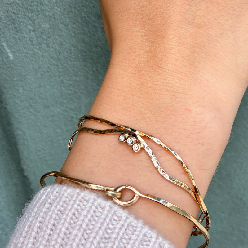 Twisted armbånd i 14 karat guld