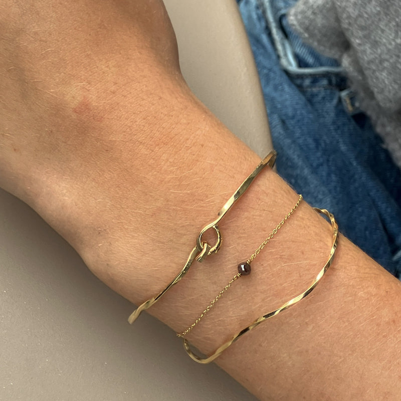 Twisted armbånd i 14 karat guld