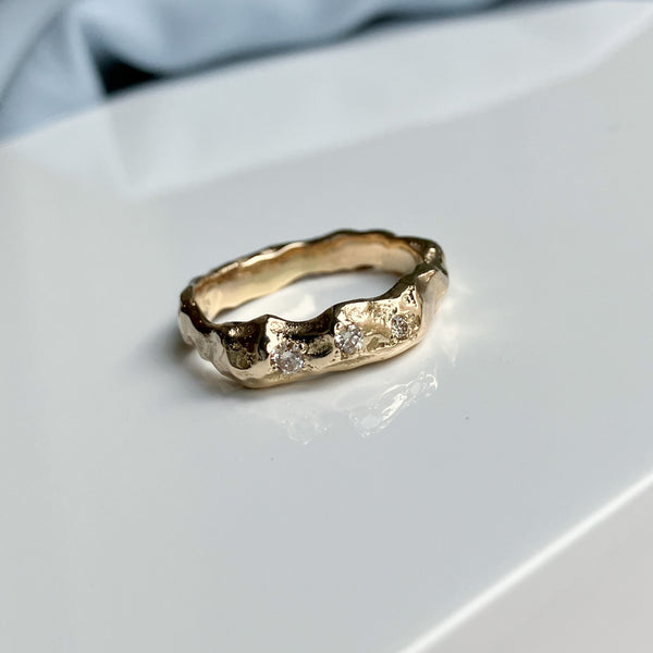 Atlas ring i 14 karat guld med 0,10 ct champagne diamanter