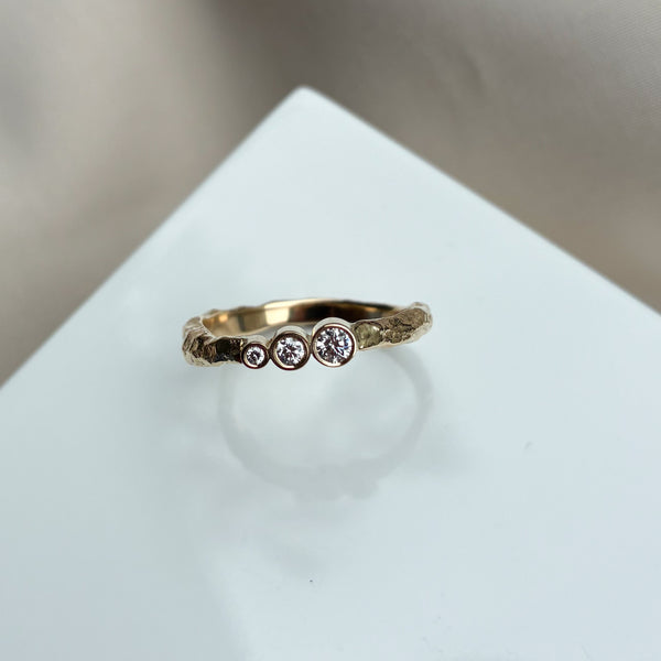 Merkur ring i 14 karat guld med 0,10 ct tw/vs diamanter