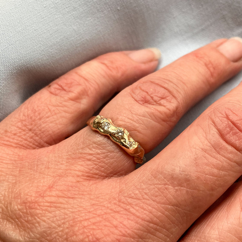 Atlas ring i 14 karat guld med 0,10 ct champagne diamanter